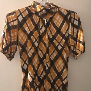 Mustard and brown top